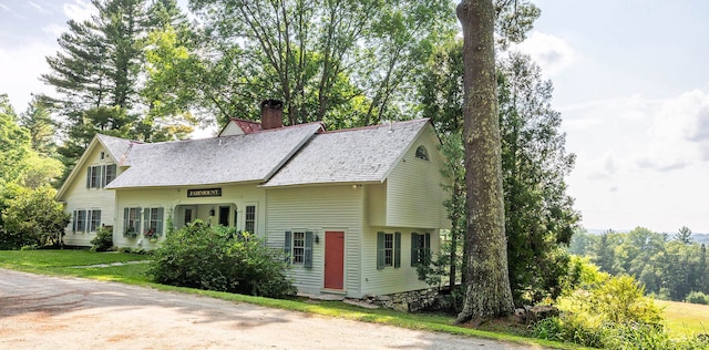 exterior space featuring a front lawn