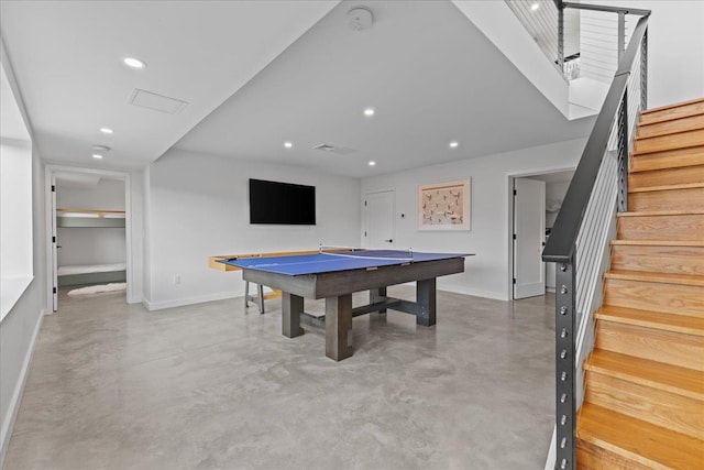 playroom featuring recessed lighting, finished concrete flooring, and baseboards