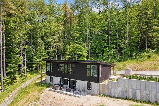 rear view of property with a patio