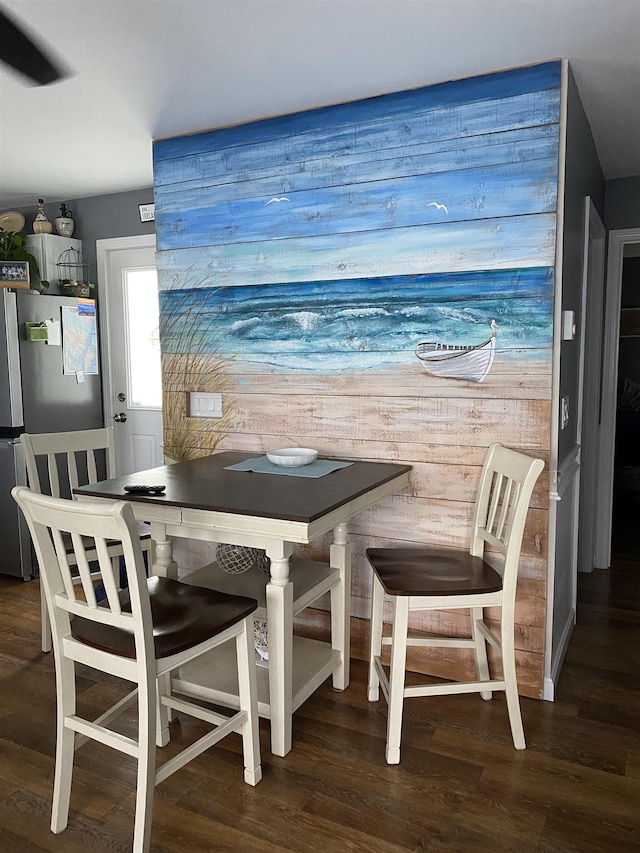 dining area featuring wood finished floors