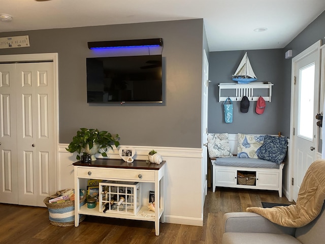 living area with wood finished floors