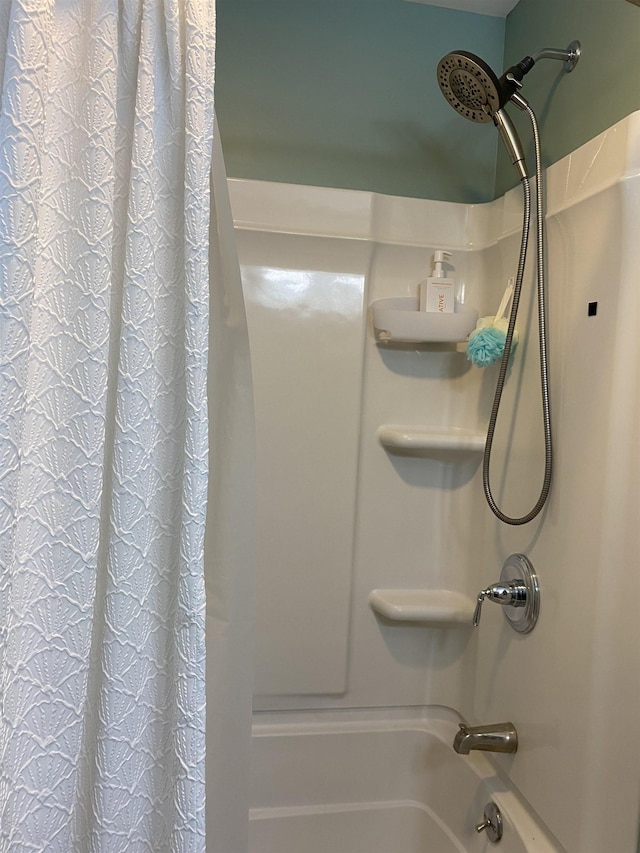 full bathroom with shower / bath combination with curtain