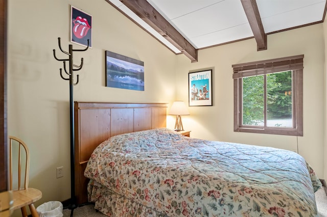 bedroom with carpet and vaulted ceiling with beams