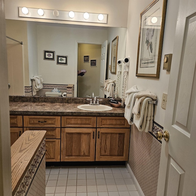 bathroom featuring vanity and tile patterned floors