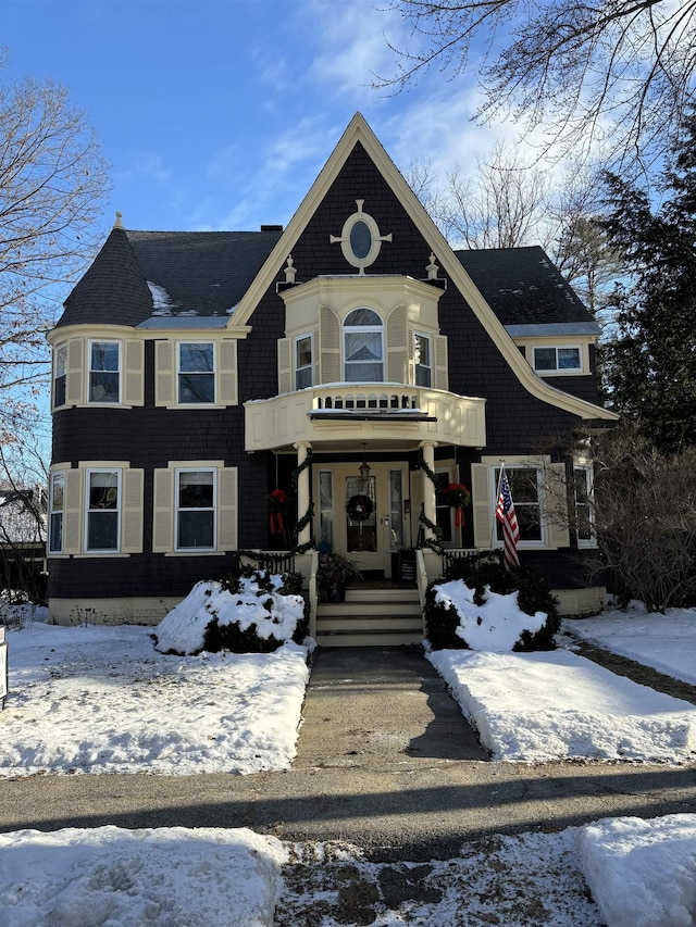 victorian home featuring covered porch