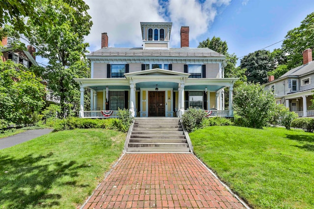 italianate home featuring a porch and a front lawn