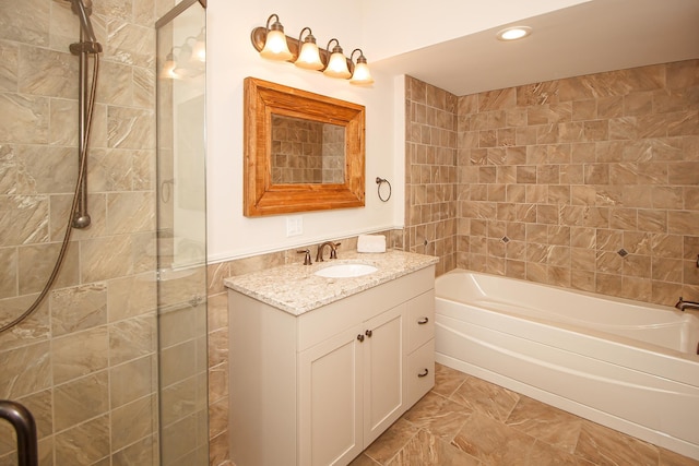 bathroom with vanity and tile patterned flooring