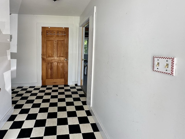 10 Hawthorne St, Plymouth, NH 03264 - hall with baseboards and tile patterned floors