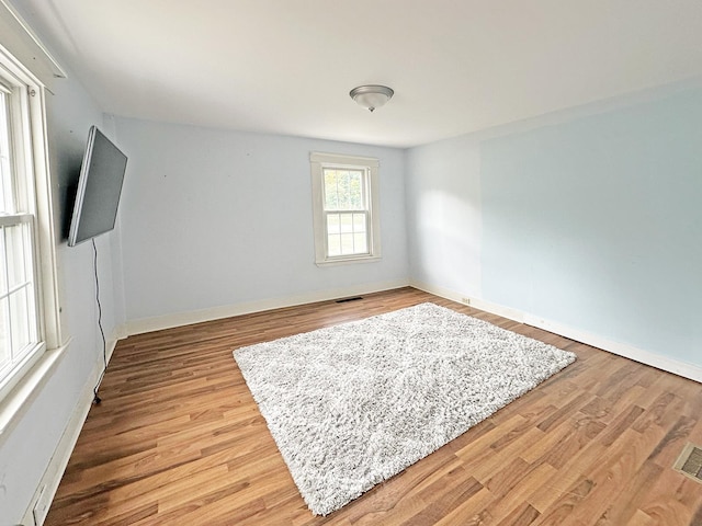 10 Hawthorne St, Plymouth, NH 03264 - spare room featuring light wood finished floors and baseboards