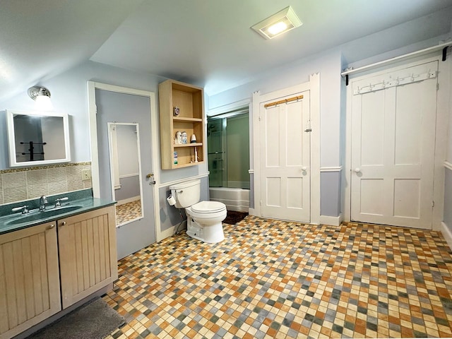 full bathroom featuring decorative backsplash, shower / bath combination, vanity, and toilet