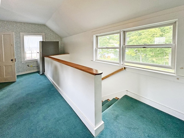 10 Hawthorne St, Plymouth, NH 03264 - staircase featuring vaulted ceiling, carpet floors, and baseboards