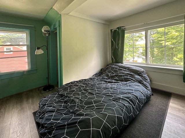 bedroom featuring hardwood / wood-style floors