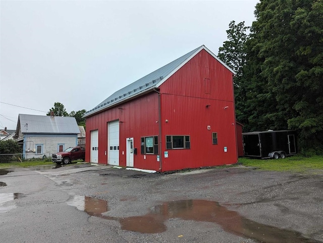 view of outdoor structure with a garage