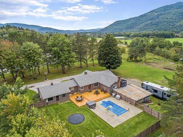 ranch-style home featuring a garage and a front yard