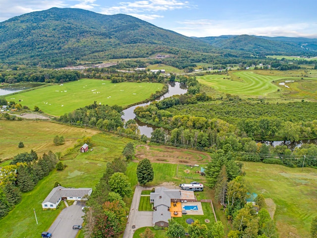 aerial view featuring a water and mountain view