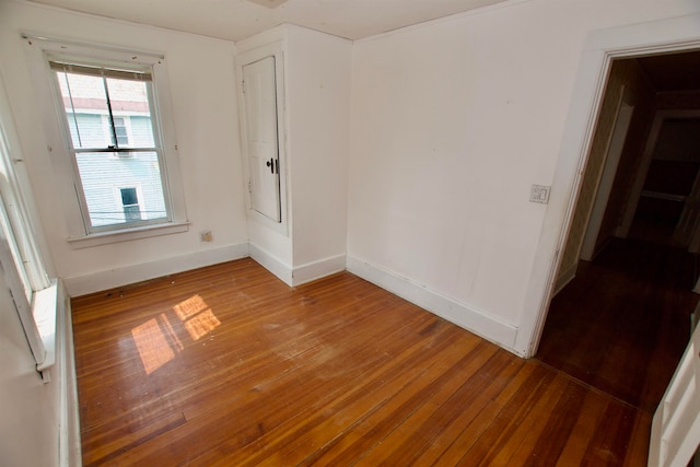 empty room featuring hardwood / wood-style flooring