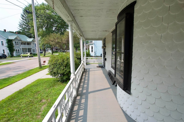 view of patio featuring a porch