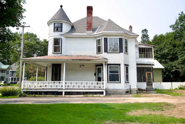 victorian home with a front yard