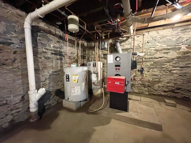 utilities with gas water heater and water heater