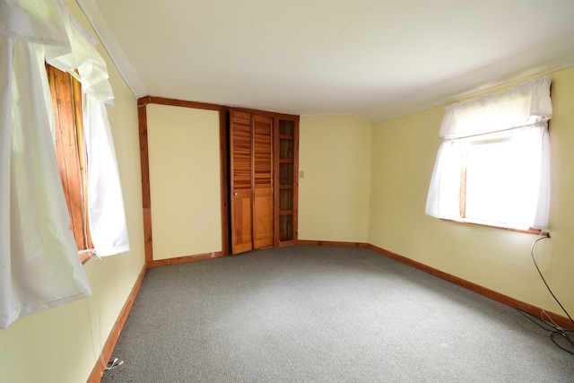 unfurnished bedroom with carpet