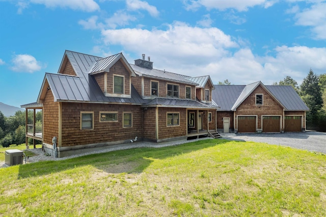 cabin with a front yard and a porch