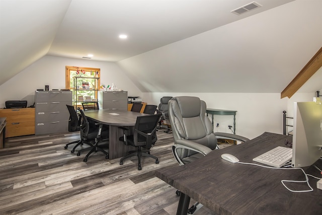 office area featuring lofted ceiling and dark hardwood / wood-style floors