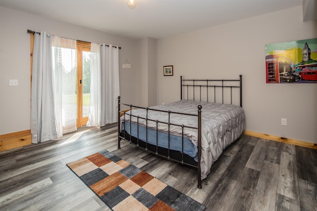bedroom featuring dark hardwood / wood-style floors