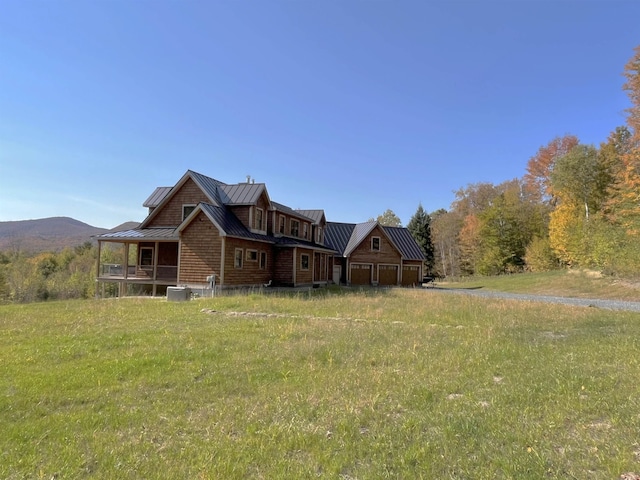 log cabin featuring a mountain view