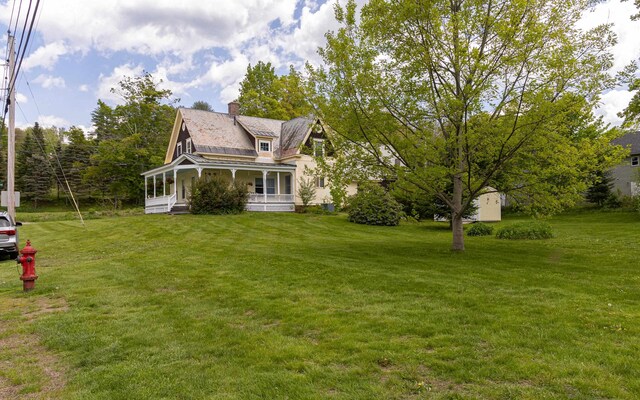 view of yard with a porch