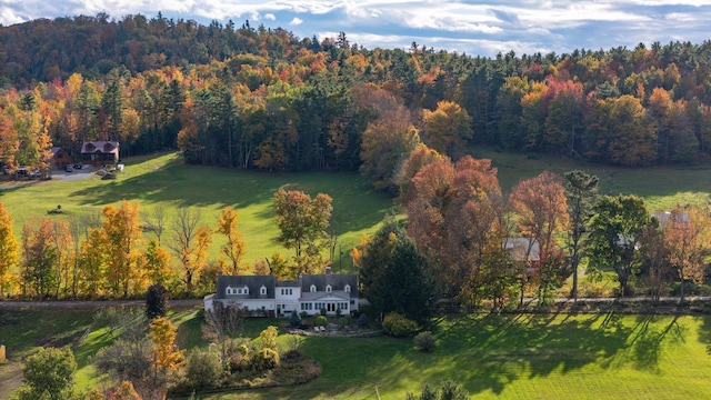 aerial view featuring a rural view and a forest view