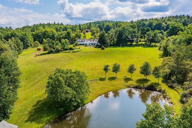 drone / aerial view featuring a water view and a rural view