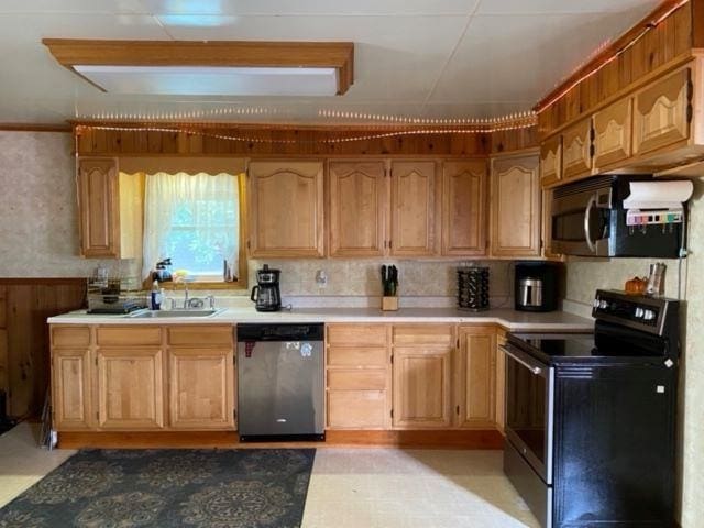 kitchen with appliances with stainless steel finishes and sink