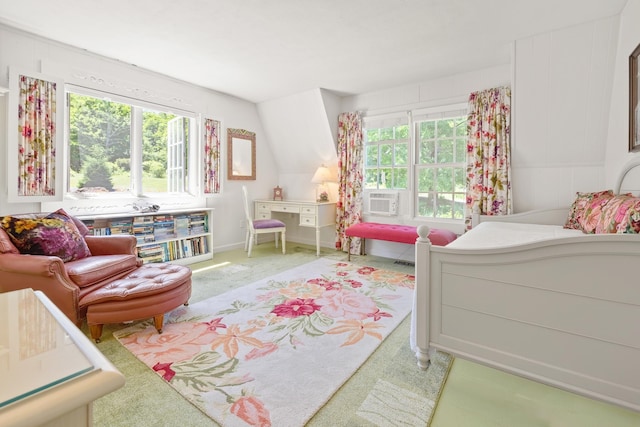 carpeted bedroom featuring lofted ceiling, cooling unit, and multiple windows