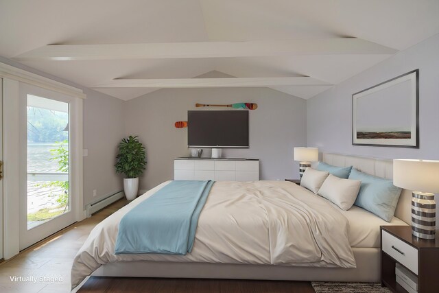 living room with a water view, lofted ceiling, and a wealth of natural light