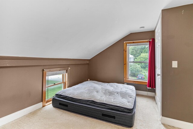 14 School St, Highgate, VT 05459 - bedroom featuring baseboards, lofted ceiling, and carpet floors