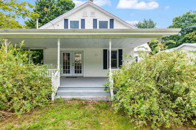 14 School St, Highgate, VT 05459 - back of house featuring covered porch and french doors