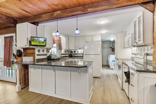 14 School St, Highgate, VT 05459 - kitchen featuring white cabinetry, a peninsula, white appliances, beamed ceiling, and light wood-style floors