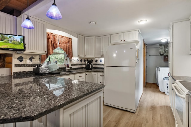 14 School St, Highgate, VT 05459 - kitchen featuring light wood-style flooring, white appliances, dark stone counters, a sink, and hanging light fixtures