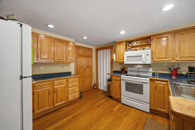 kitchen with white appliances, open shelves, light wood-style floors, and recessed lighting