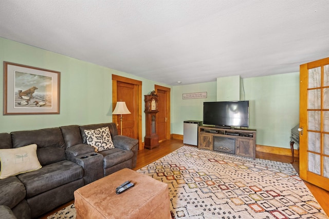 living area with wood finished floors