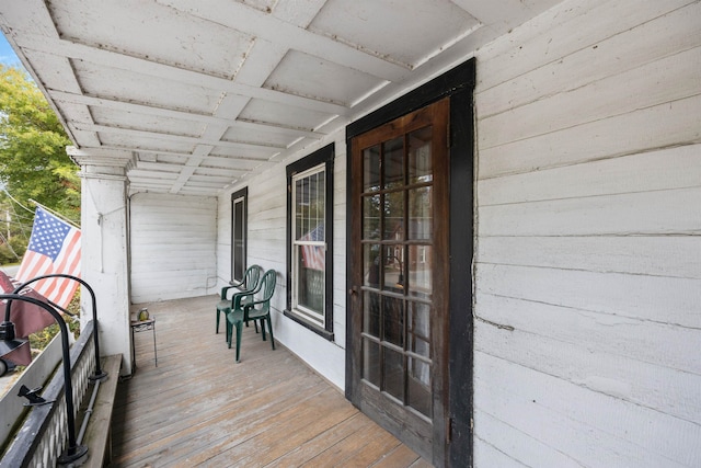 wooden deck featuring covered porch