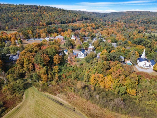 aerial view featuring a wooded view