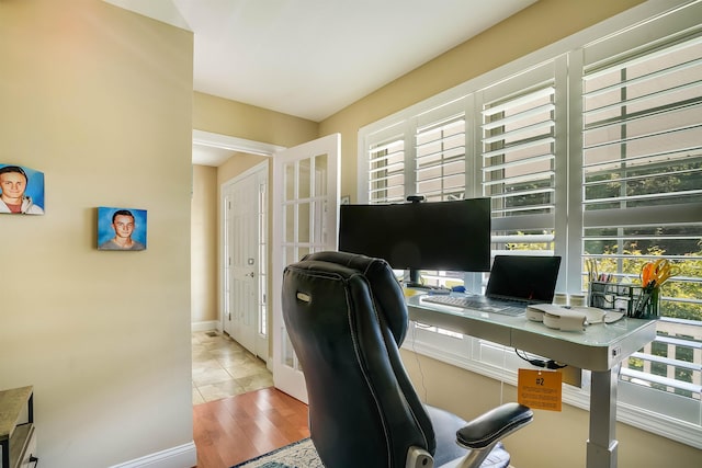 home office featuring light hardwood / wood-style floors