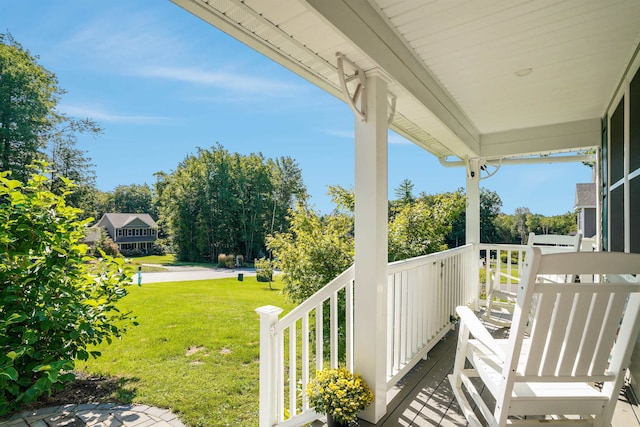 exterior space featuring a yard and a porch