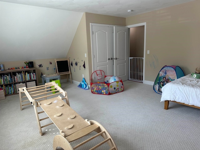 interior space featuring lofted ceiling and carpet floors