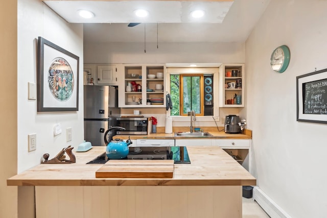 office area featuring sink and baseboard heating