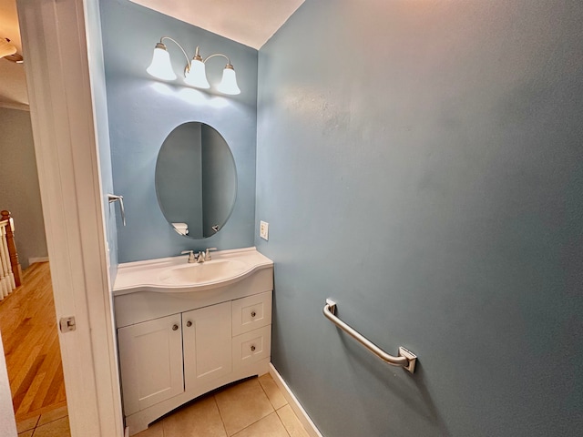 bathroom featuring vanity and hardwood / wood-style flooring