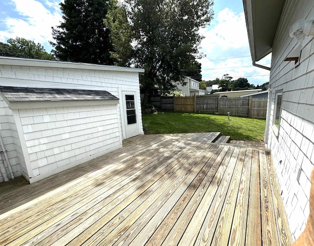 wooden deck with a yard