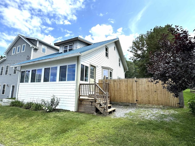 exterior space with a lawn