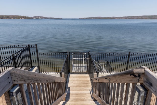 exterior space with a water view